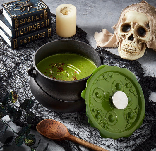 Enameled cast iron green 'bubbling' lid cauldron